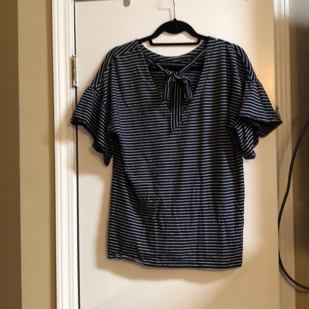 Banana Rep top w/ ruffle sleeves & tie backdetail.